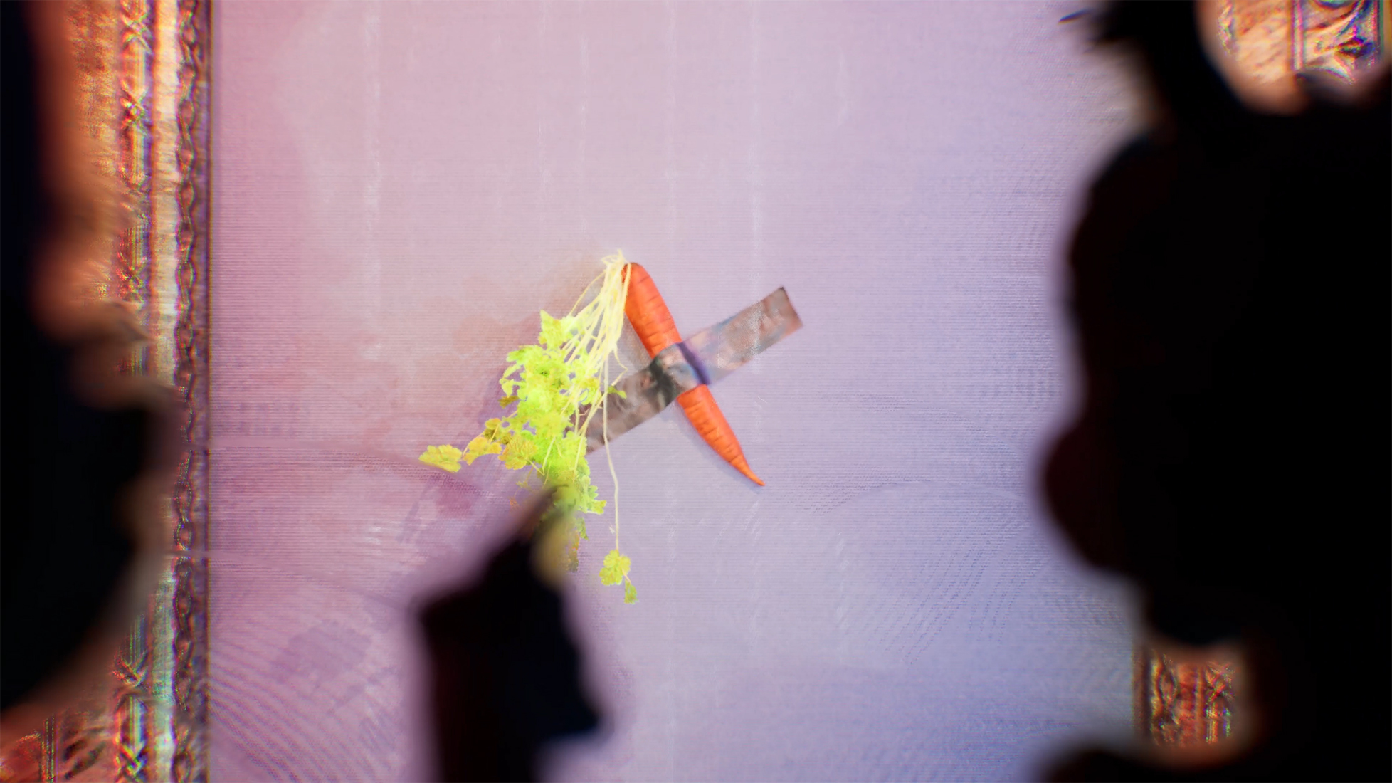 Carrot taped to canvas